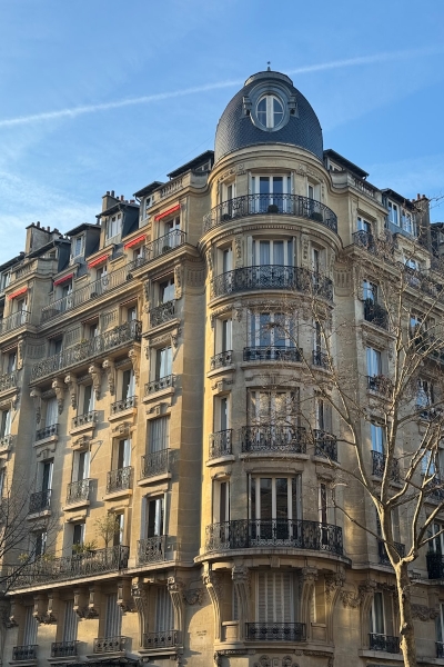 A tall building with a clock on the top of it
